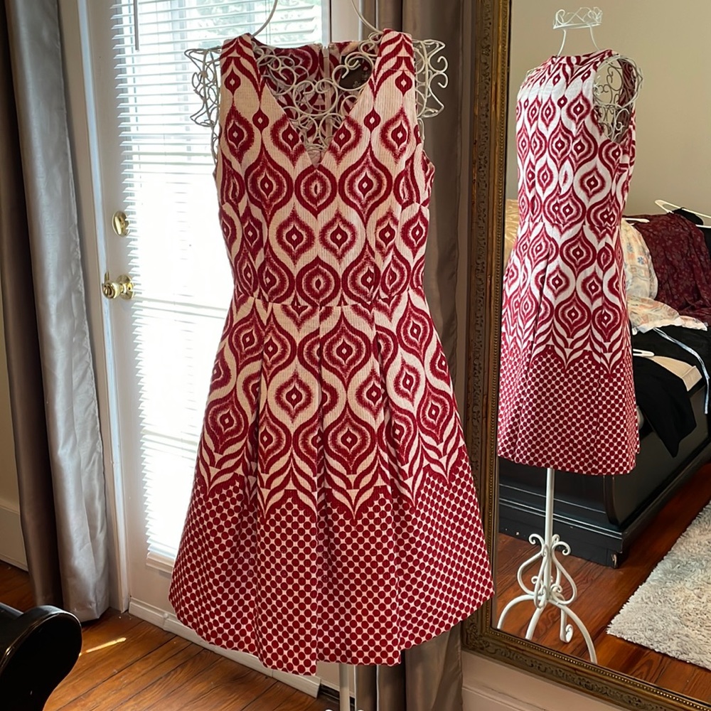 Sleeveless, box pleat dress with side pockets